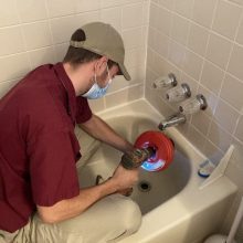 Cleaning a Tub Drain